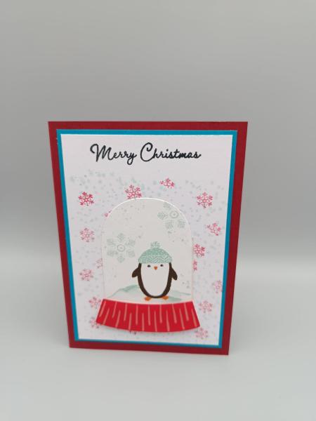 Weihnachtskarte "Pinguin im Schneeglas"